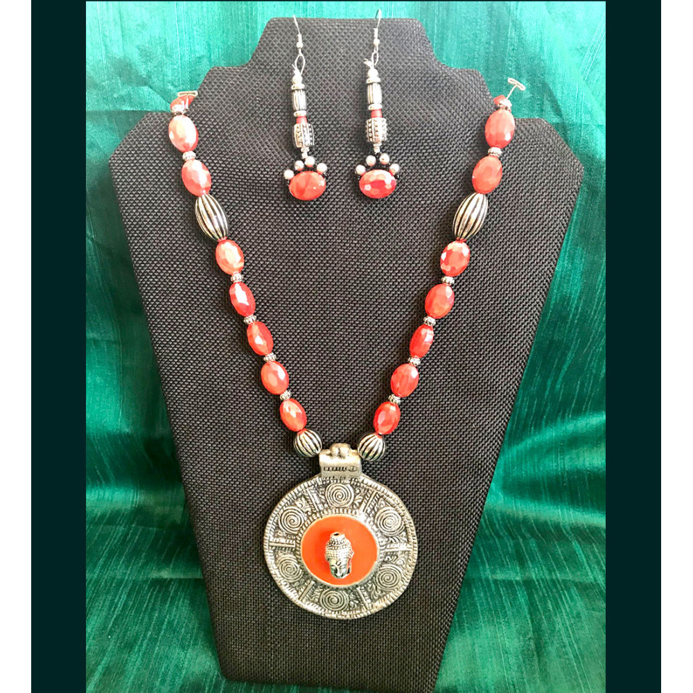 CBHJ6 Orange beads with oxidized pendant                     
