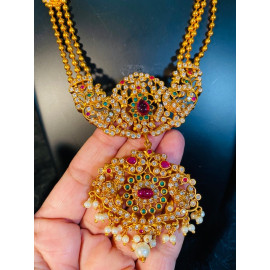 TJX9 3 row gold beads with real kemp and green stones